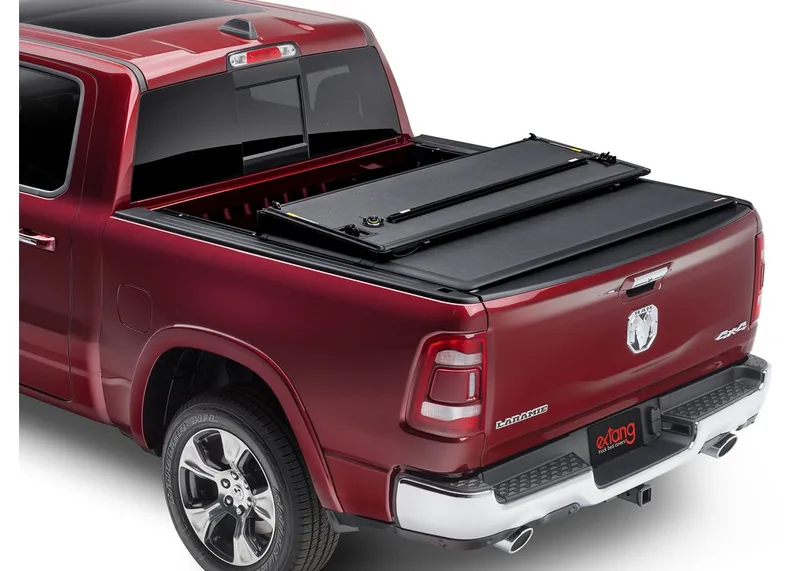 Extang Encore hard folding tonneau cover with painted panels on a RAM truck