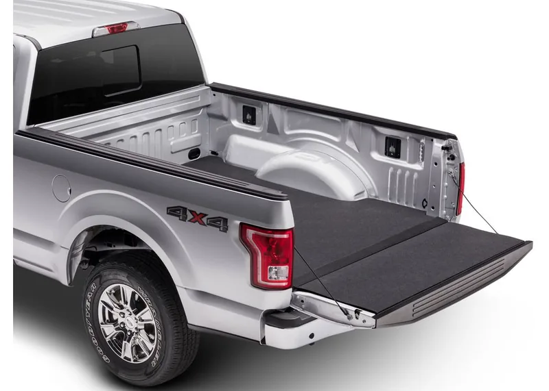 Fitted cargo mat protecting a truck bed floor under smaller loads
