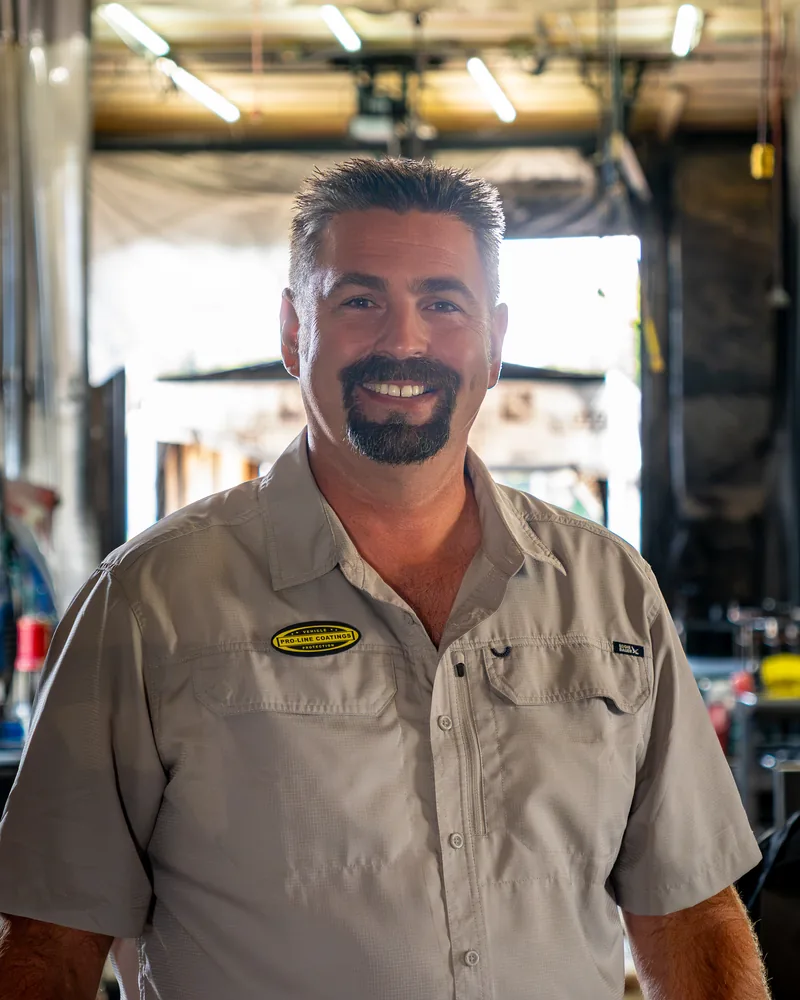 Wade, owner of Pro-Line Coatings, in the shop at 3737 Wilder Rd in Bay City